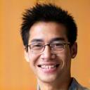 Gambar potret Encik Tan Wei Liang yang kelihatan gembira.